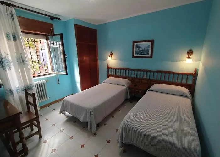 Pensión El Castañu, Cue