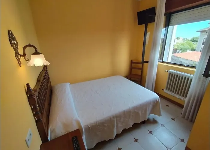 Pensión El Castañu, Cue