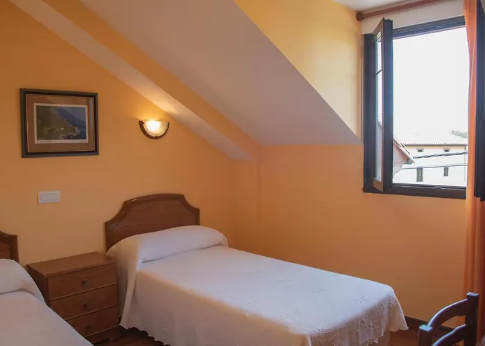 Pensión El Castañu, Cue