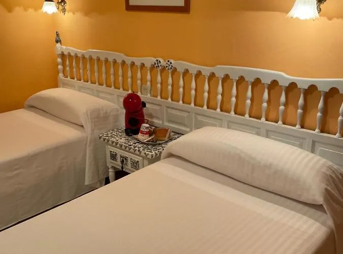 El Castañu, Pensión Cue